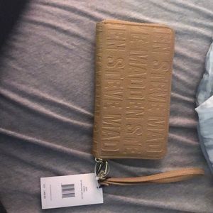 COPY - Steve Madden tan colored wristlet
